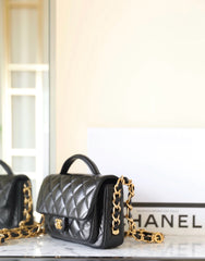 cc 24a flap bag 20cm top handle black lambskin gold hardware