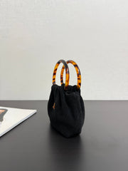 Chanel 2026 Mini Pouch 16cm Black Tortoiseshell Suede Effect Plexi