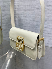 FLAP BAG 18 IN WHITE PATENT CALFSKIN