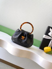 Chanel 2026 Mini Pouch 12cm Tortoiseshell Leather Effect Plexi