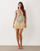 embellished scoop neck mini dress with faux feather hem in pale yellow