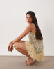 embellished scoop neck mini dress with faux feather hem in pale yellow