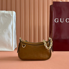GG Emblem Mini Shoulder Bag Brown Embossed Cowhide